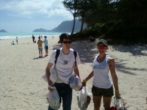 0218121140b man and woman picking up garbage