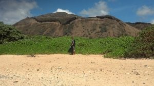 2013-07-13+10.53.24 Man picking up garbage
