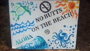 2013-07-13+11.35.02 No butts on the beach sign