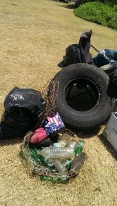 2013-07-13+11.49.45 pile of tires and garbage