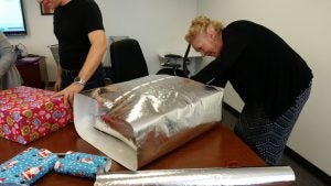 20171208_124913 Woman wrapping gift