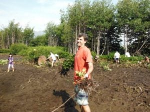 Man holding plants