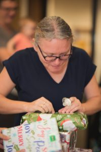 DSC09490 woman wrapping present