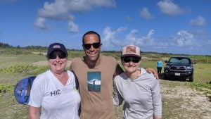 IMG_20190921_090241 Two women and a man smiling for camera