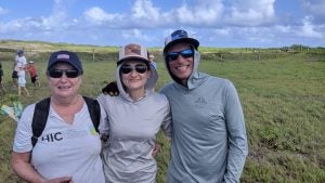 IMG_20190921_092258 two women and one man smiling at camera