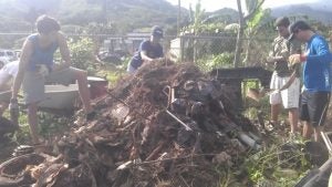 Group of people on a garbage heap