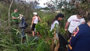 Group of people on a garbage heap