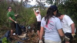 Group of people on a garbage heap