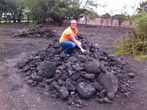 image25 woman on top of rock pile