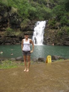 waimea+019 woman in shorts in front of waterfall